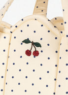 OEKO-TEX cotton bassinet showing cream fabric with blue polka dot pattern