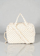 Navy dot tote bag with dual carry options handles and crossbody strap for doll play