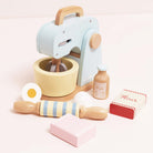Retro-style toy mixer with moving whisk flour sugar and eggs