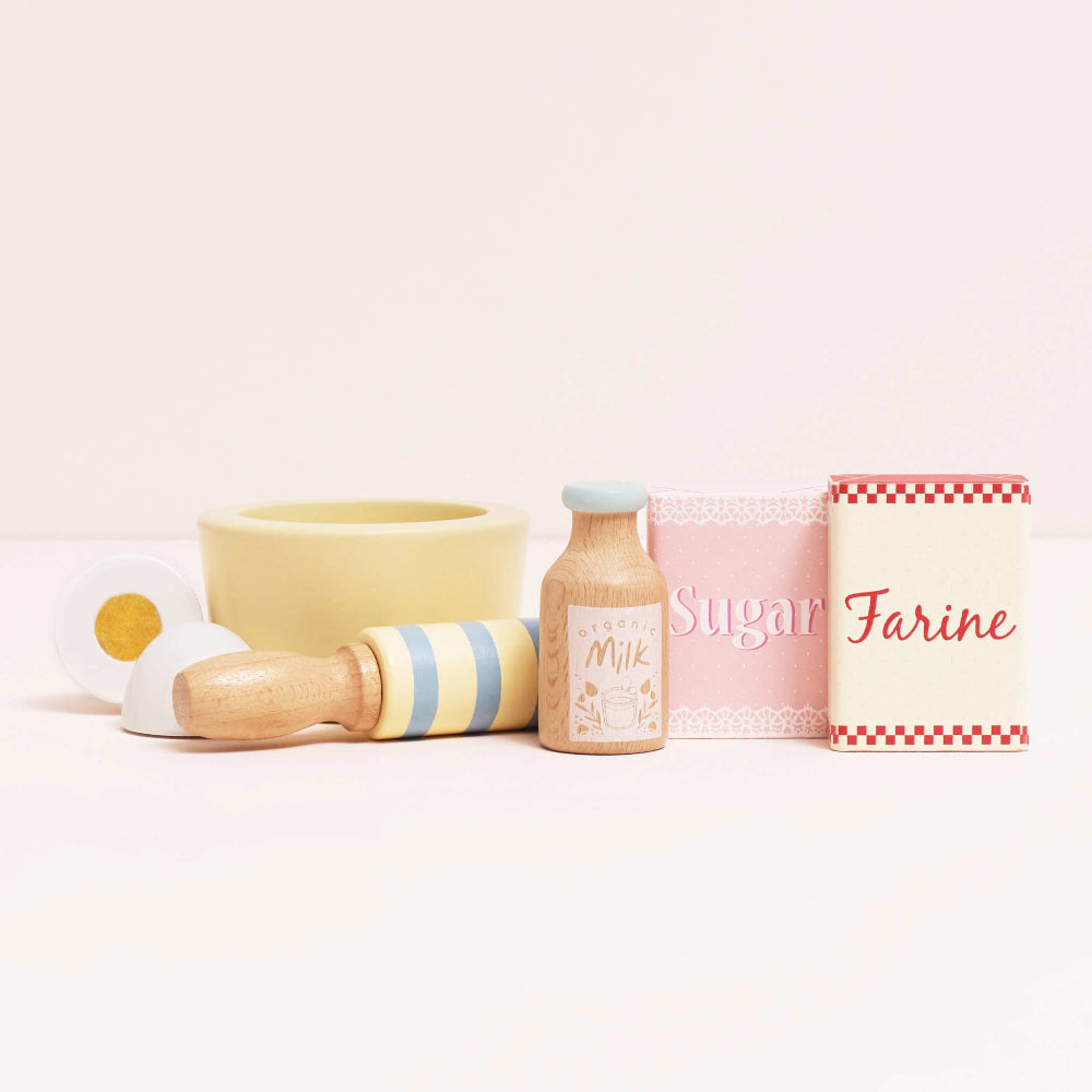 Complete baking set showing all accessories and ingredients included