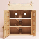 FSC-certified wooden dollhouse showing interior staircase and attic ladder