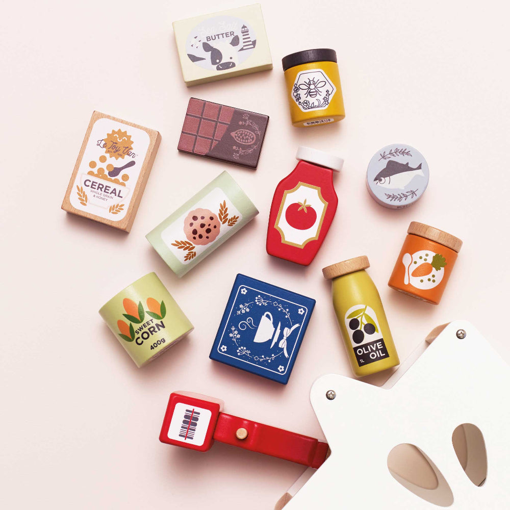 Complete wooden market play set showing colorful illustrated food items and basket