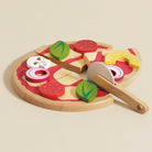 British made sliceable wooden pizza with toppings in pizza box packaging