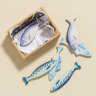 British made wooden fish toys in storage crate with realistic illustrations
