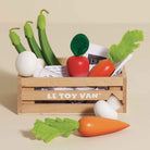 British made wooden vegetable toys in storage crate for market pretend play