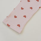 High-quality cotton spandex children's comfort wear in pink with mauve heart pattern