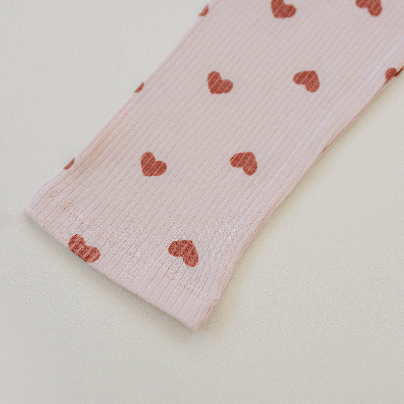 High-quality cotton spandex children's comfort wear in pink with mauve heart pattern