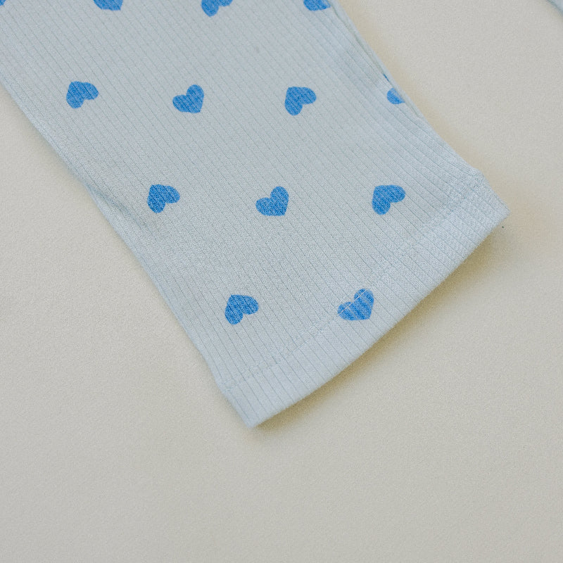 Stretchy cotton spandex kids comfort wear in soft pink with blue heart design