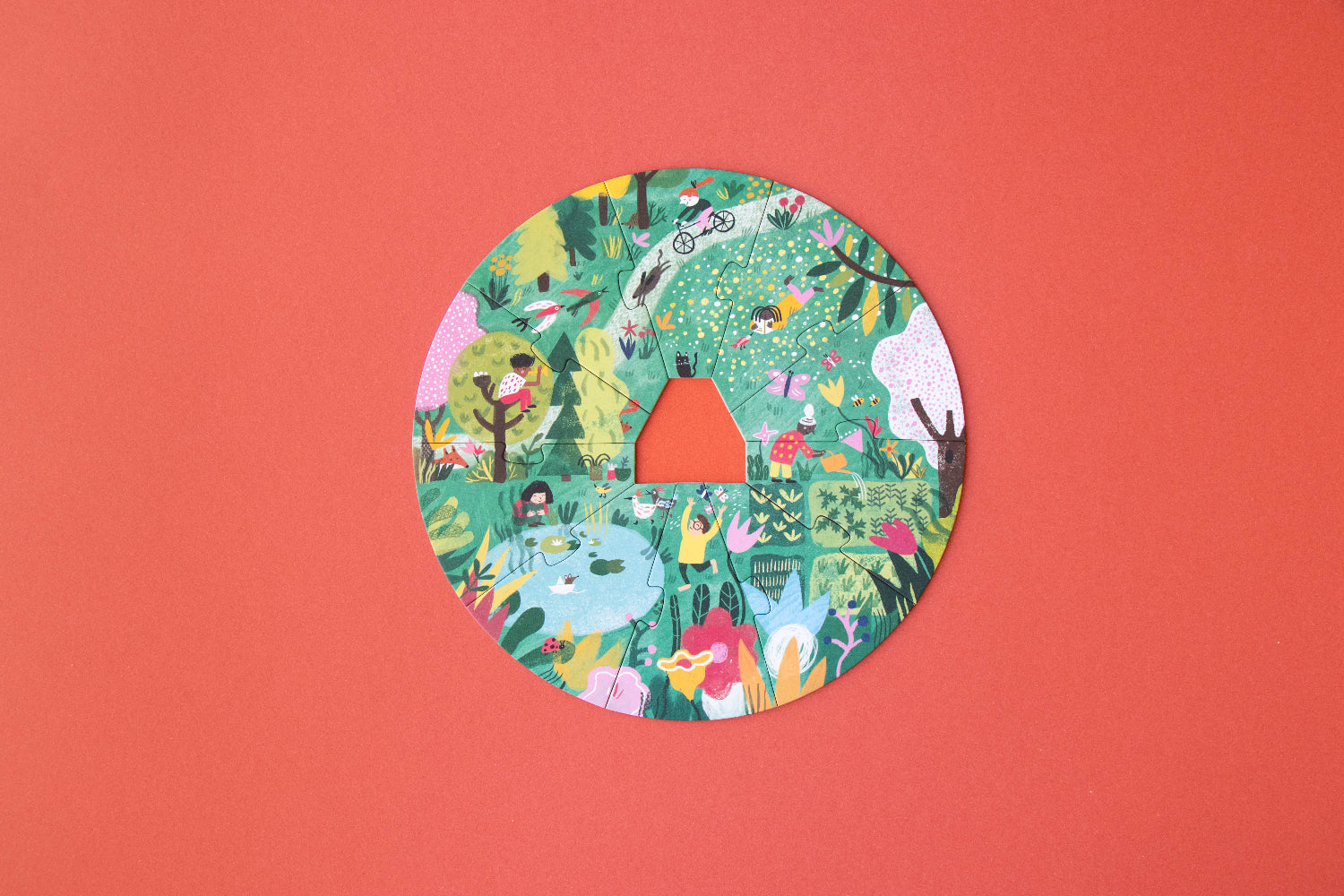 Circular cutout with colorful illustrations on a red background