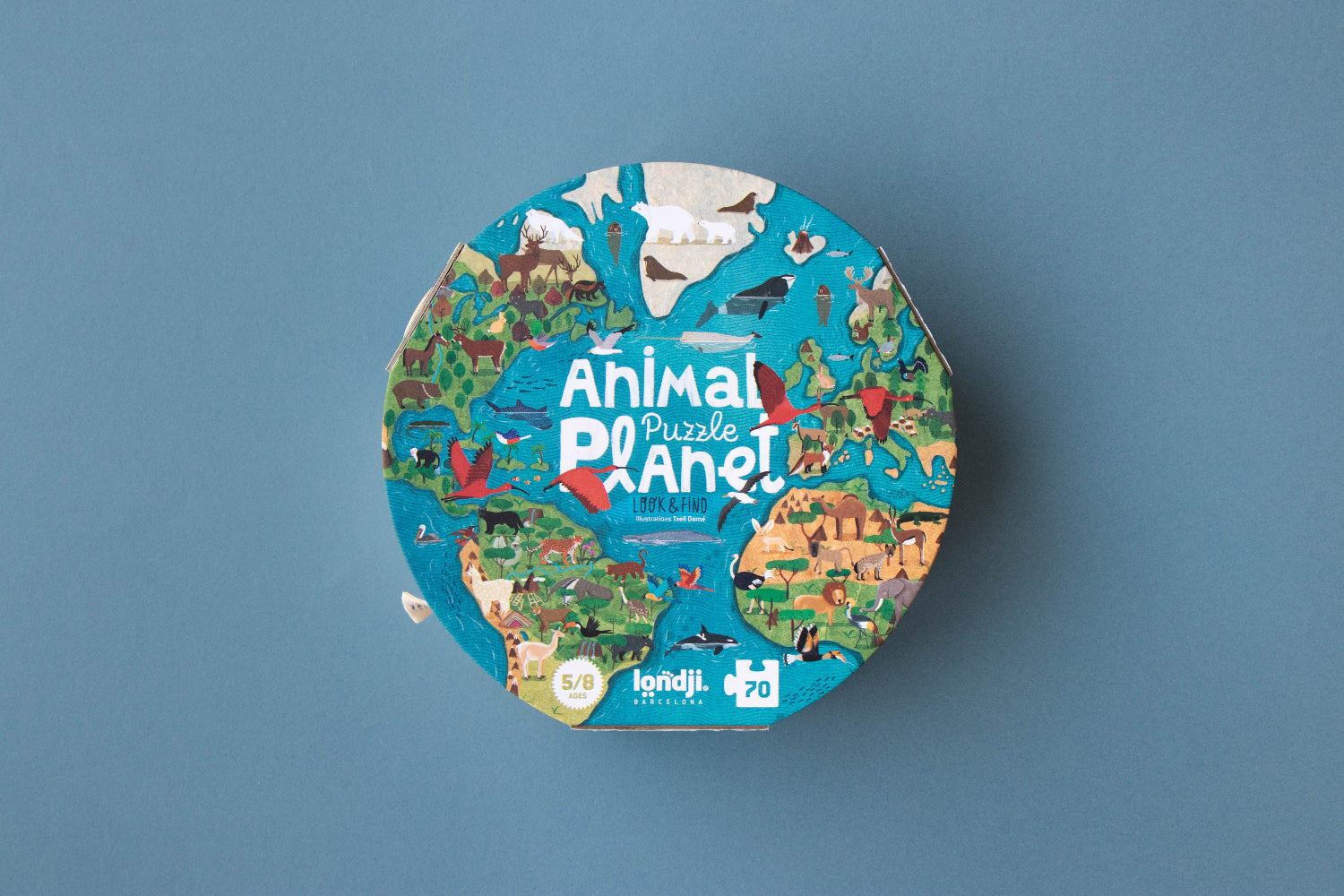 Round puzzle box with 'Animal Puzzle Planet' design on a blue background