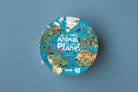 Round puzzle box with 'Animal Puzzle Planet' design on a blue background