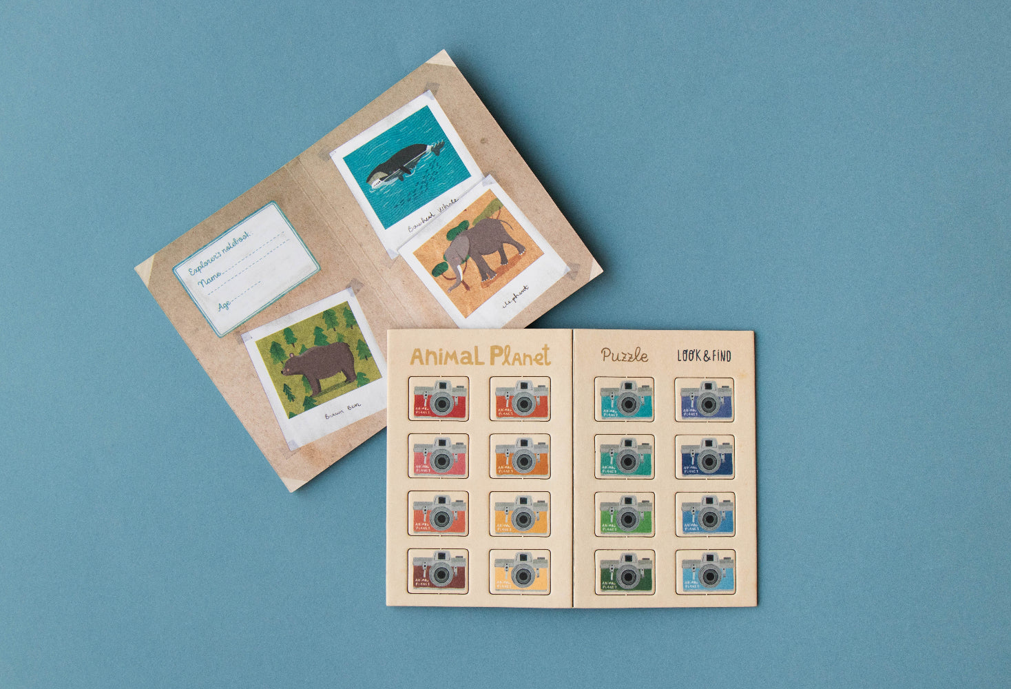 Educational puzzle book with animal illustrations on a blue background