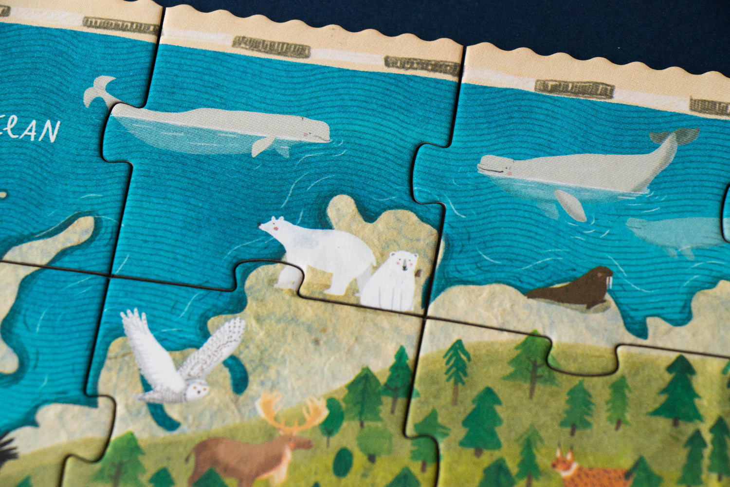 Jigsaw puzzle pieces depicting animals in a natural setting