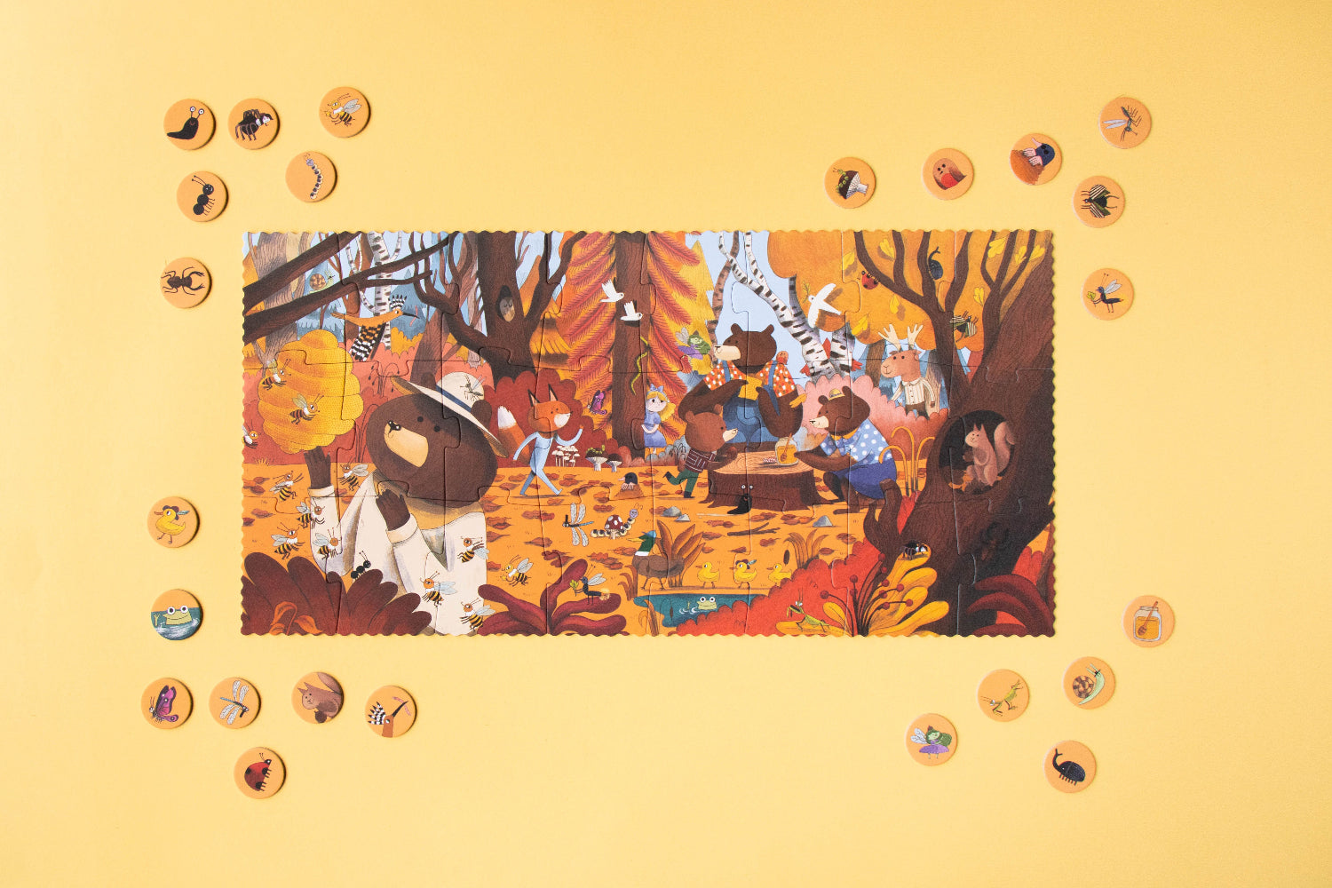Illustration of bears in a forest setting with autumn leaves on a yellow background