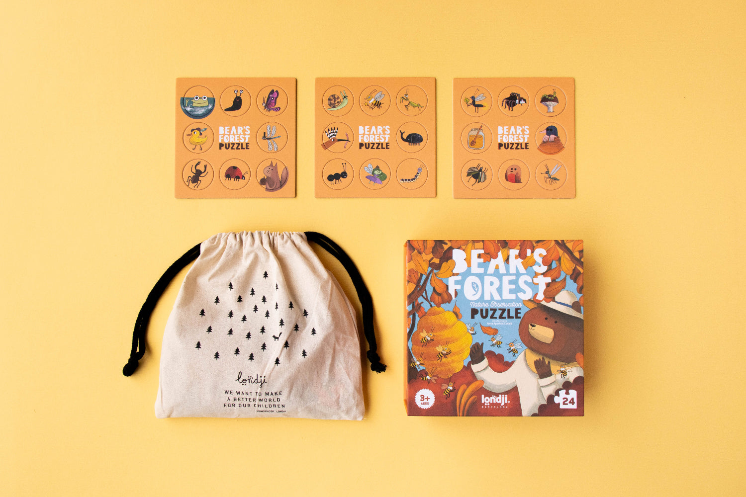 Puzzle boxes with animal illustrations on a yellow background