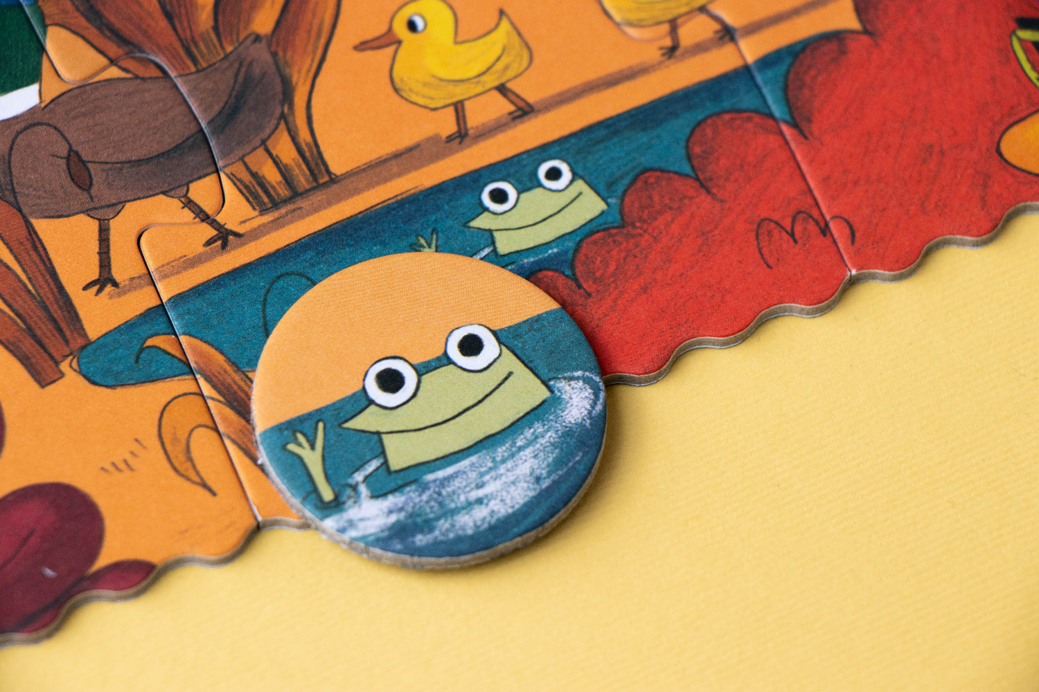Children's puzzle with cartoon characters on a yellow background
