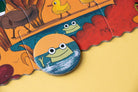 Children's puzzle with cartoon characters on a yellow background