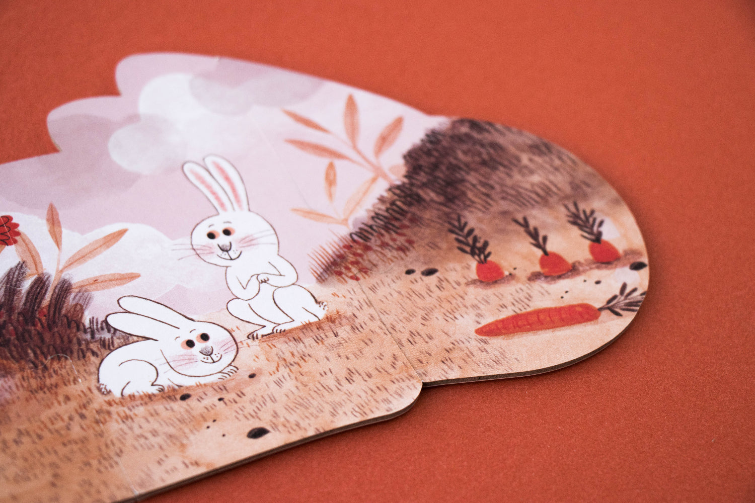 Puzzle with rabbit illustrations on a red background