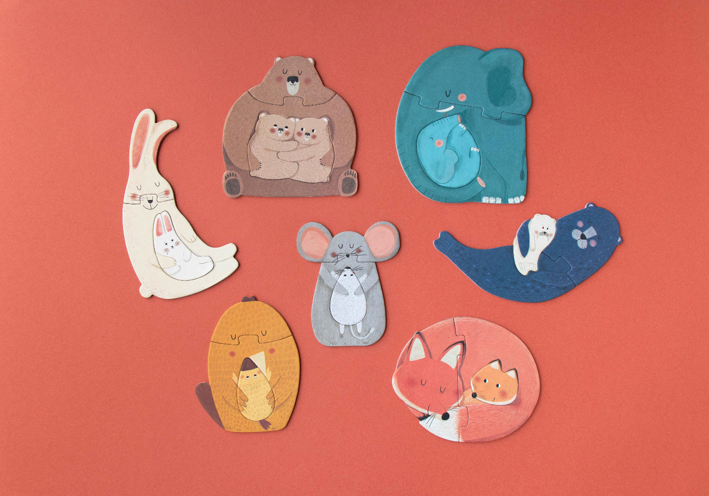 Set of animal-shaped puzzles on a red background