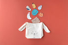 Canvas bag with cat face design and puzzles on a red background