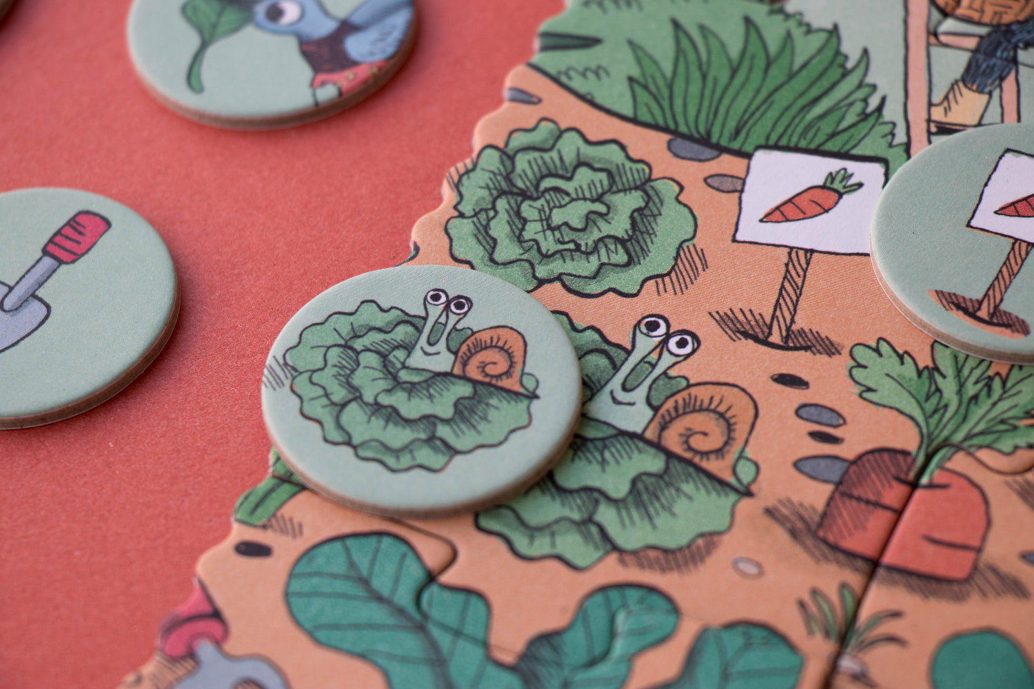 Colorful buttons with garden-themed designs on a matching card