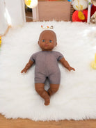 African American Doll on a rug