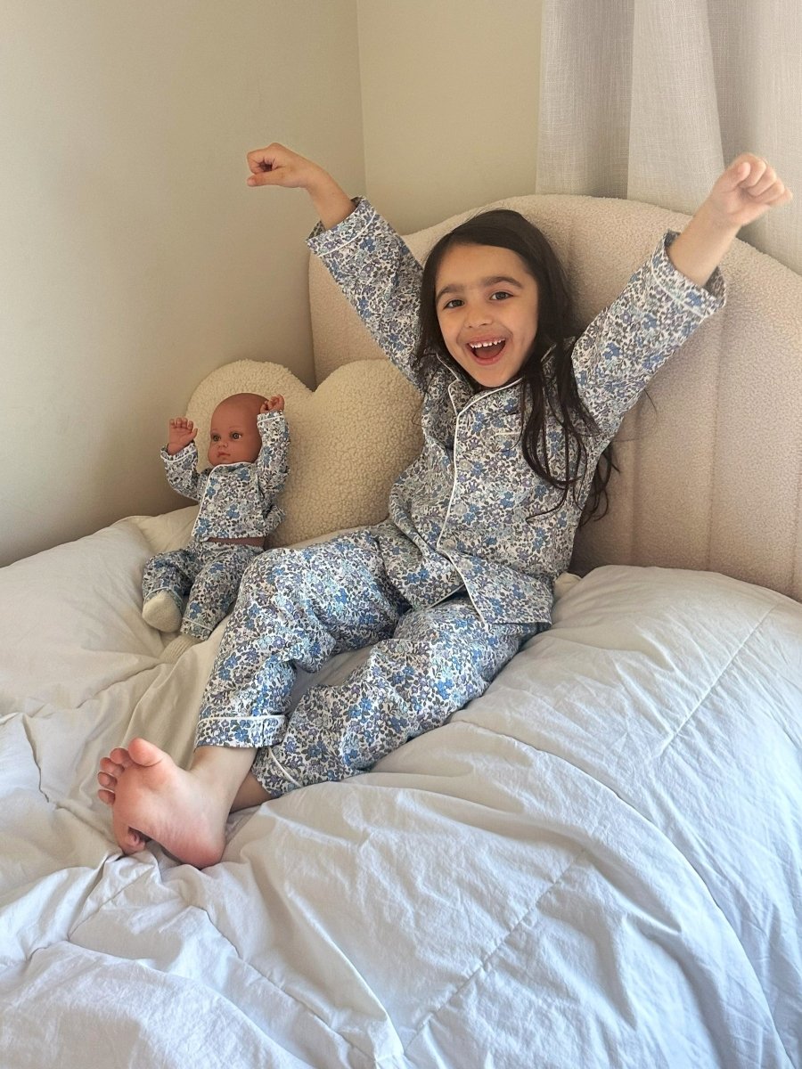 Handcrafted American girl doll clothes with detailed embroidery