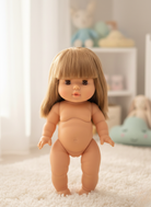 Blonde Minikane doll with articulated limbs for versatile posing during pretend play