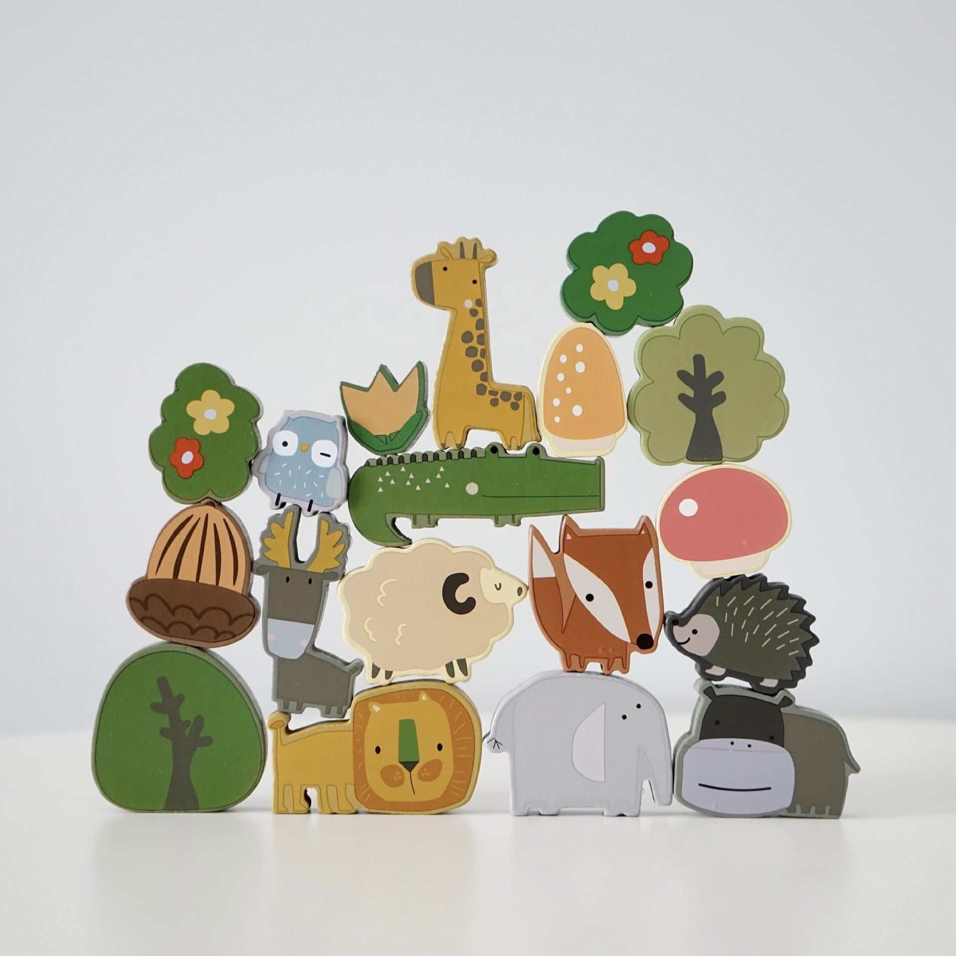 Non-toxic painted wooden animal stacking blocks with nature elements for developmental play