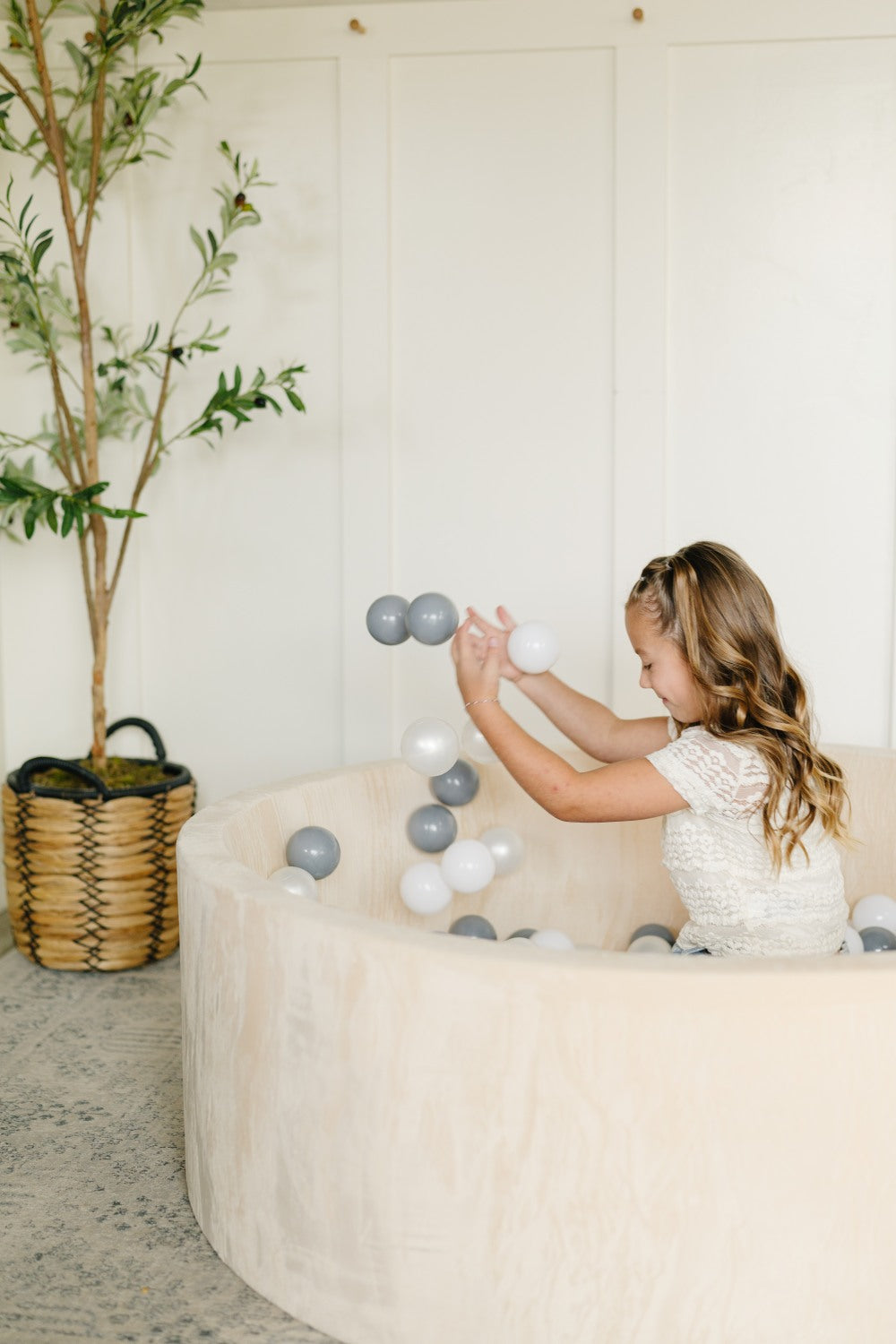 Older Girl in Ball Pit