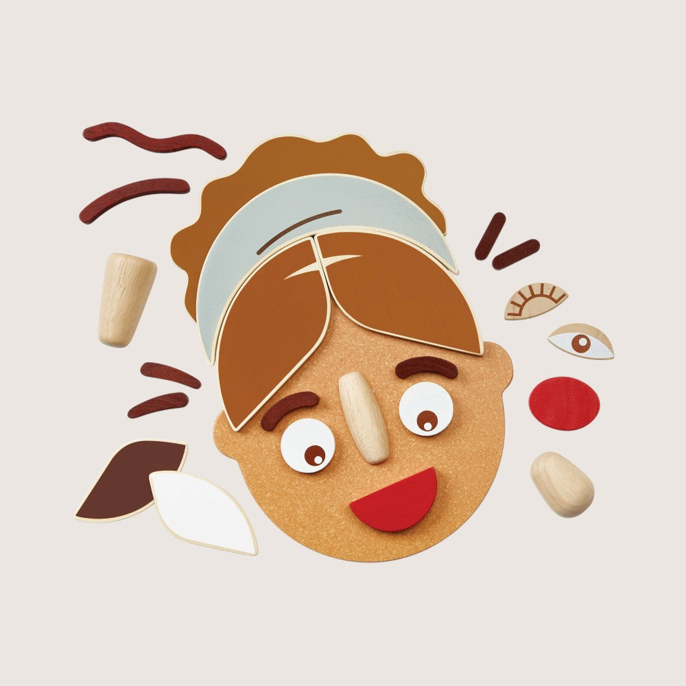 PlanToys Build a Face showing multiple expressions and skin tone options