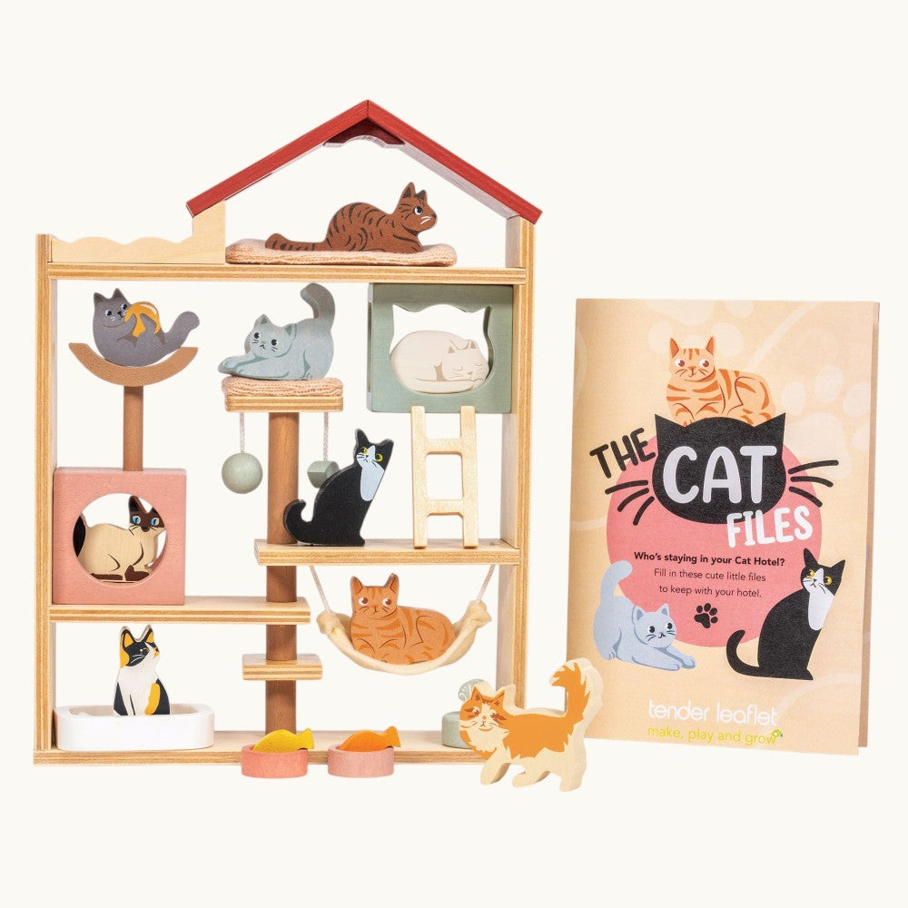 Cat playhouse with various cat-themed items and 'The Cat Files' book on a white background