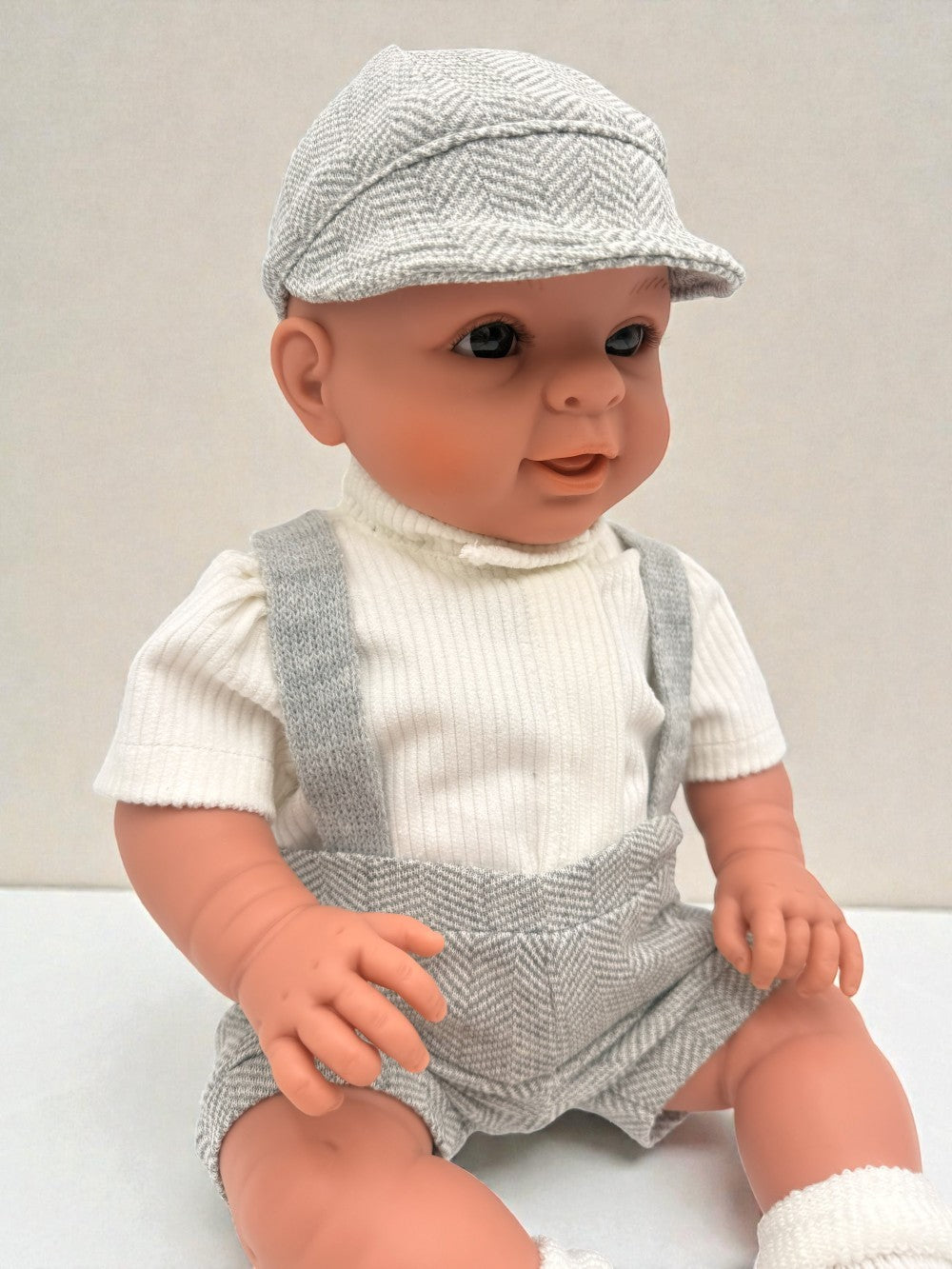 European-quality 18" boy doll in vintage grey overalls with hand-constructed articulated limbs