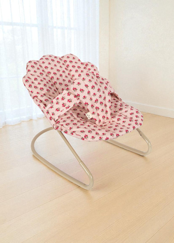 Rosie Rose doll bouncer with vintage pink rose print fabric seat and champagne metal frame showing branded label
