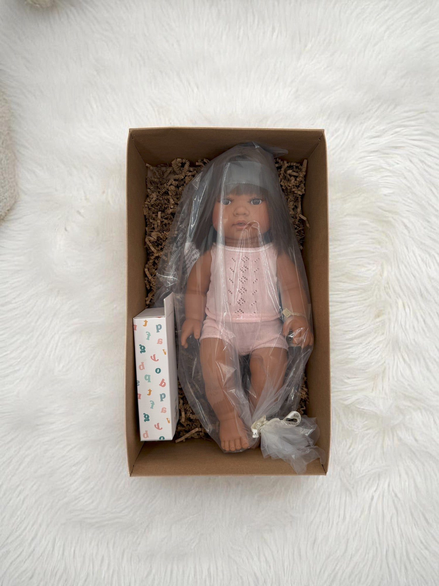 Savannah multicultural baby doll with realistic features ideal for children's playroom representation activities