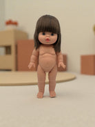 Minikane hard body Chloe doll standing independently with articulated limbs