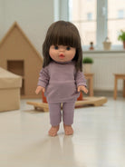 14-inch standing Minikane Chloe doll with modern dark bob and bright blue eyes