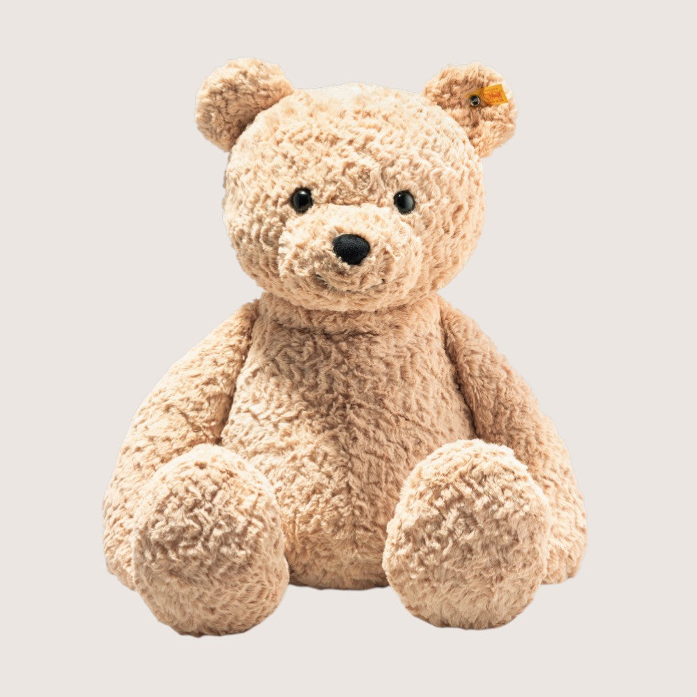 Plush teddy bear on a light gray background