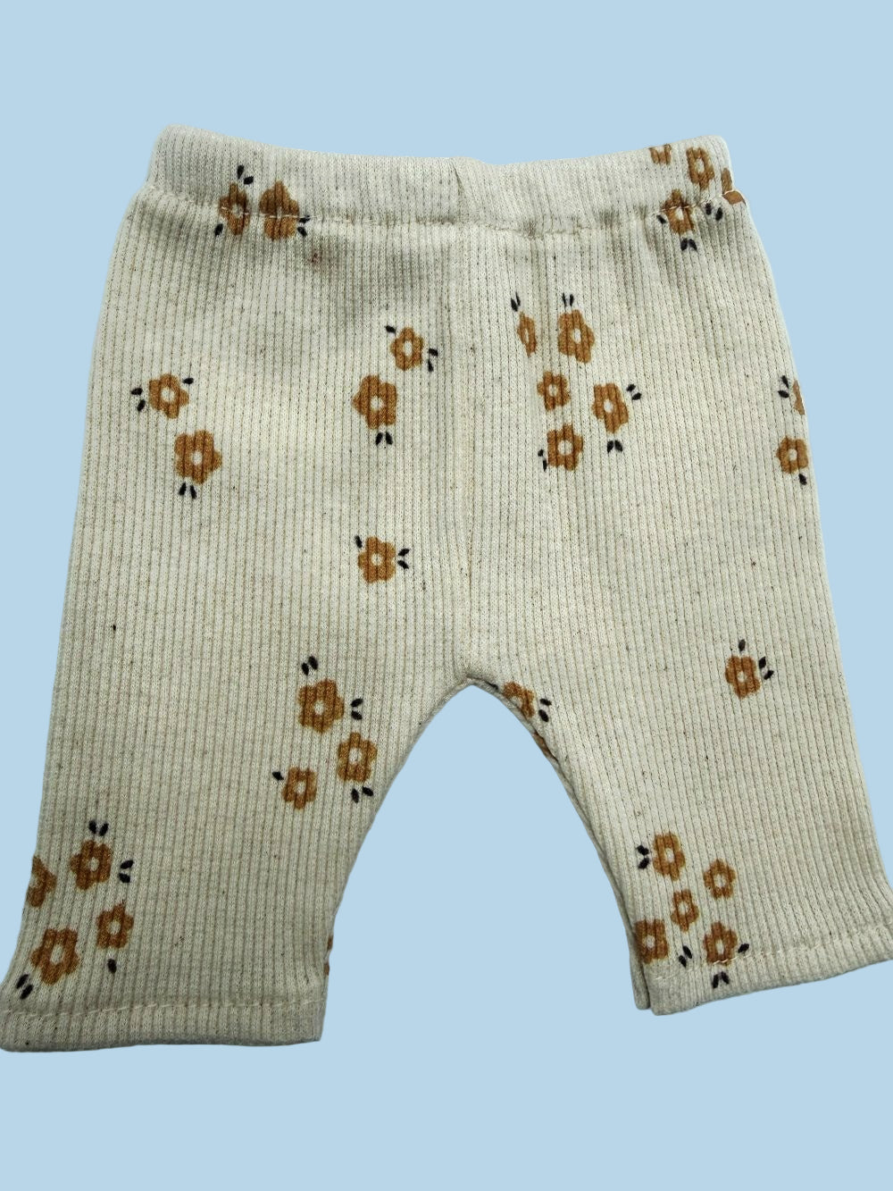 Complete doll sweatshirt and pants outfit in soft Caramel Petals print for pretend play