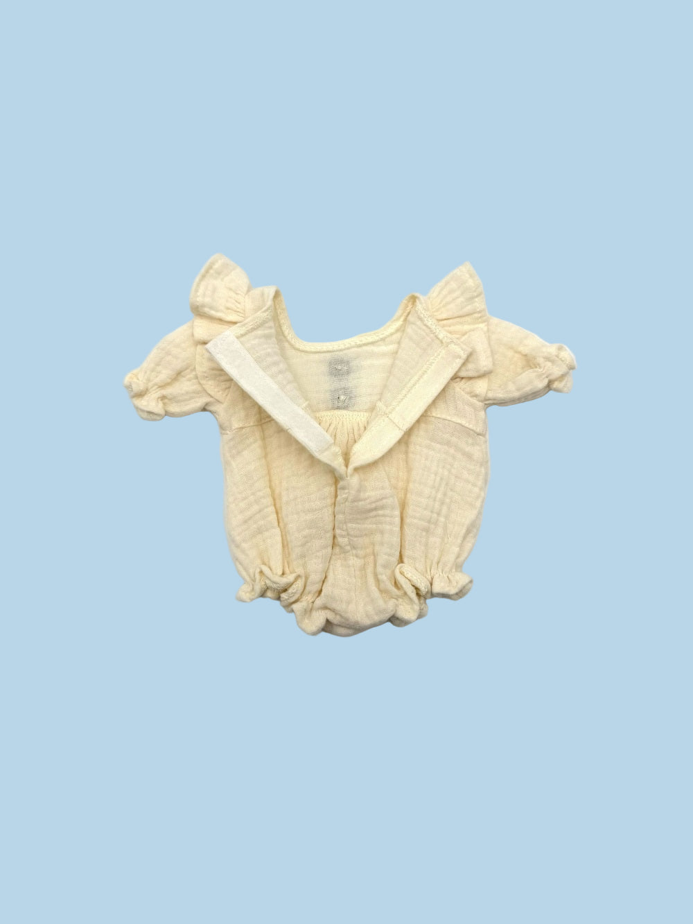 Classic flutter sleeve doll romper in vanilla cream with gathered bloomer-style legs