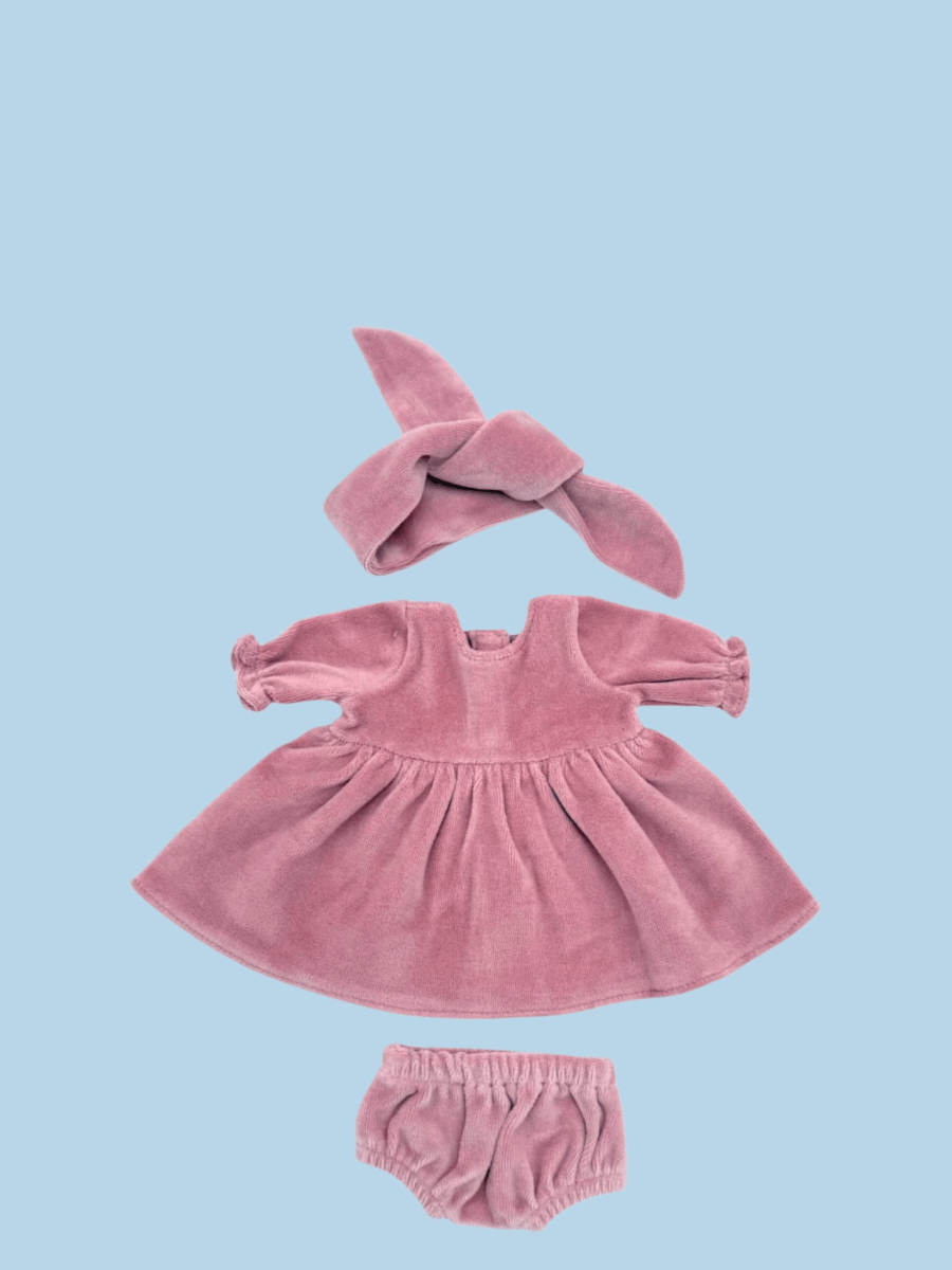Doll outfits encouraging fine motor skill development
