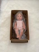 Baby dolls for toddlers Vienna with straight blonde hair and realistic vinyl construction for lasting play
