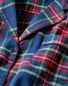 Navy tartan children's sleepwear with traditional notched collar and button front closure