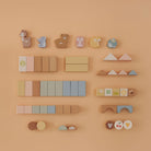Flat lay of all 50 pieces organized by type showing 6 animal blocks and 44 shape blocks in assorted colors and shapes