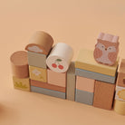 Detail check close-up showing smooth rounded edges on beechwood blocks and neat painted finish on illustrated accent blocks