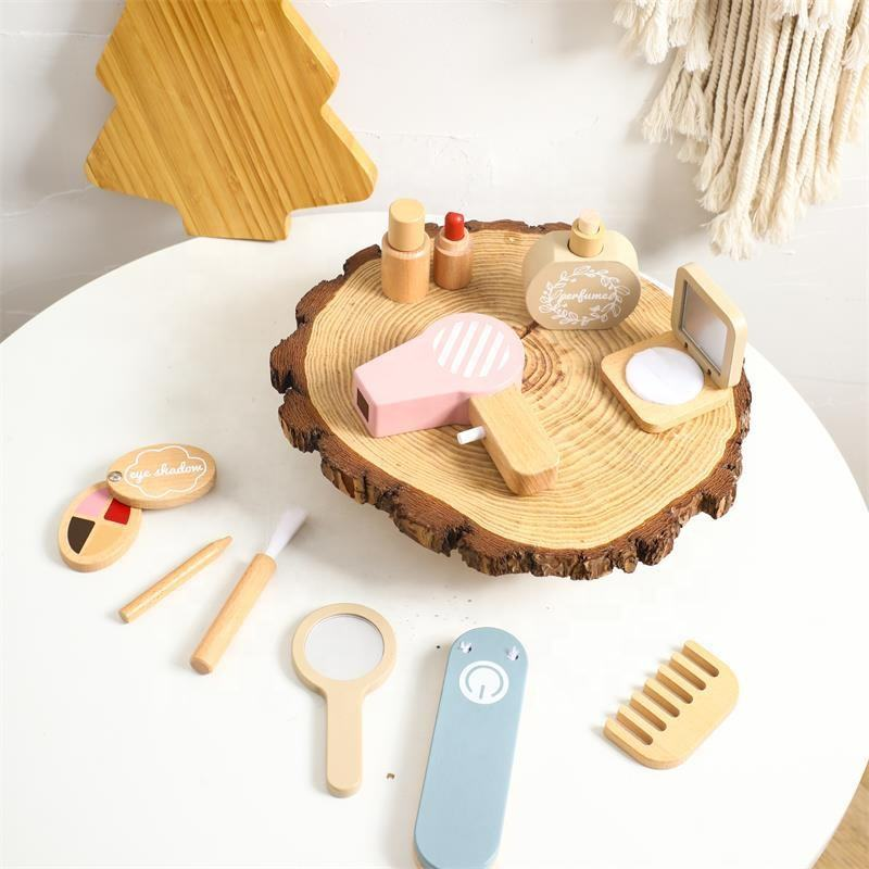 Set of wooden toys resembling a beauty salon on a white surface.