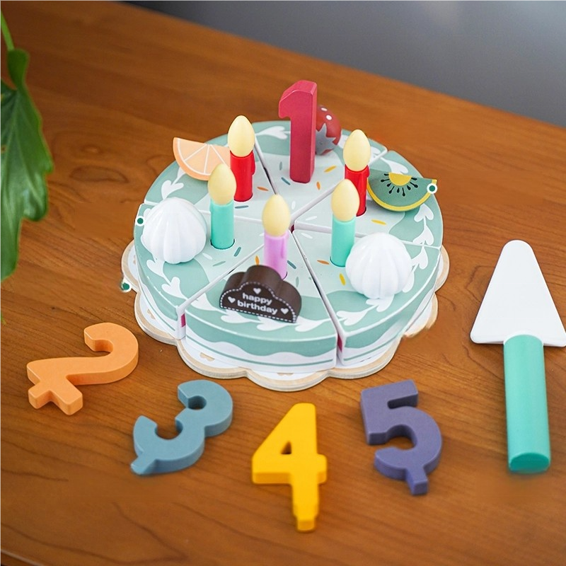Velcro connection system on wooden Montessori cake toy allowing easy assembly for young children