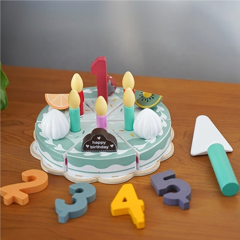 Wooden Montessori birthday cake toy with removable slices and colorful number pieces for pretend play