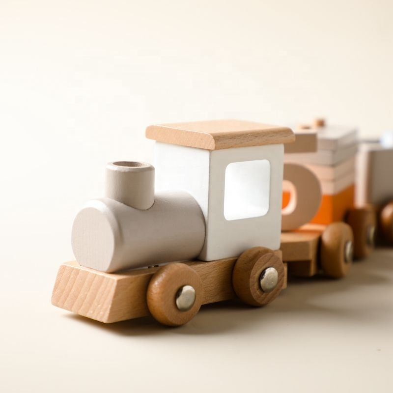Close-up detail of wooden train car connection system showing quality craftsmanship