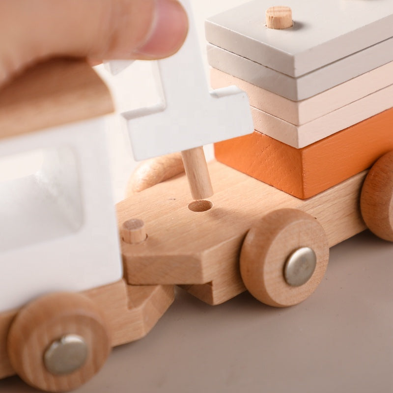 Complete Montessori wooden train set featuring engine and three unique cargo cars for developmental play